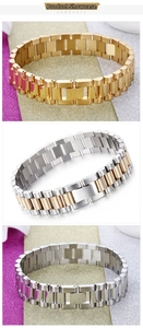 Dettaglio di bracciali a maglie da 15 mm in finitura oro, argento e acciaio bicolore