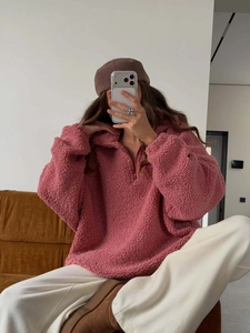 Pink sherpa fleece half-zip sweatshirt for women with a warm long-sleeve loose fit