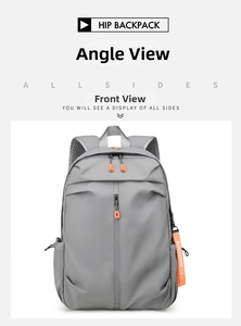 Detail of waterproof grey backpack featuring vibrant orange zippers and a vertical front pocket