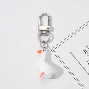 Cute white goose keychain with orange beak and silver metal D-ring for key decor