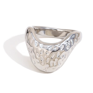 Minimalist silver irregular textured stainless steel ring with a natural hammered finish