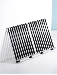 Detail of disposable adhesive ear cleaners showing 20 black spiral swabs in a row