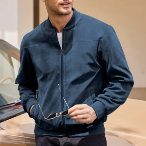 Close-up of navy suede jacket showing ribbed collar detail and smooth zipper texture