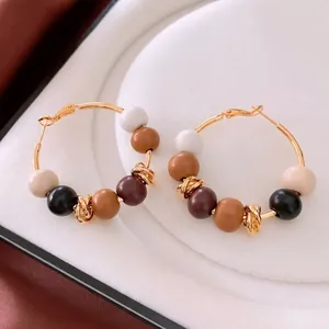 Créoles plaquées or 18 carats avec perles en bois bohème aux tons terreux vintage