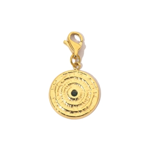 Detailed view of a gold circular textured pendant with a green zircon and lobster clasp