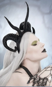 Detailed view of black gothic ram horns headband on model for cosplay party outfit