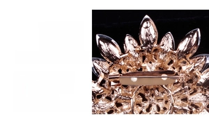 Detail of safety locking clasp and hollow alloy texture on back of crystal brooch