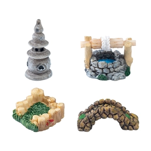 Miniature garden resin set featuring a stone tower, well, flower bed and bridge