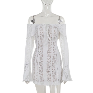 Close-up of elegant white lace off-shoulder dress with textured floral patterns and bell sleeves
