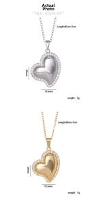 Detailed view of heart pendants with zircons showing 24mm size and 40+5cm chain length