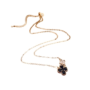 Collier élégant plaqué or rose 18 carats avec pendentif trèfle à quatre feuilles bleu