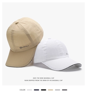 Detail view of khaki and white mesh baseball caps with breathable sporty fabric texture
