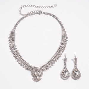 Elegant silver jewelry set with teardrop rhinestone pendant necklace and matching earrings