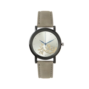 Women's quartz watch with gold floral dial and grey suede leather strap in a clean view