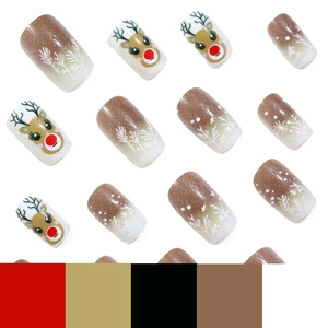 Christmas press-on nails featuring gradient glitter, snowflakes, and cute reindeer motifs