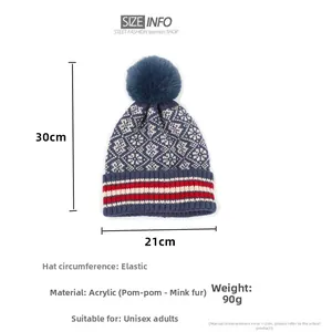 Detailed size specifications for blue knit beanie with mink fur pom pom and red stripes
