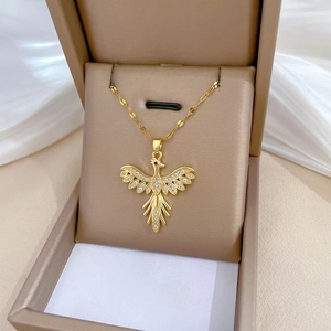 Luxurious gold phoenix necklace with sparkling crystals in a premium brown gift box