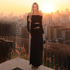 Elegant black off-shoulder long sleeve dress with waist cut-out and mesh detail