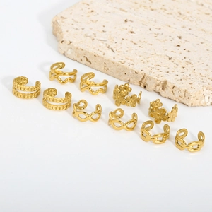 Close-up of ten assorted 18K gold-plated stainless steel non-piercing ear cuffs