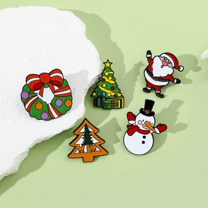 Set of 5 Christmas enamel pins including Santa Claus, snowman, and festive wreaths