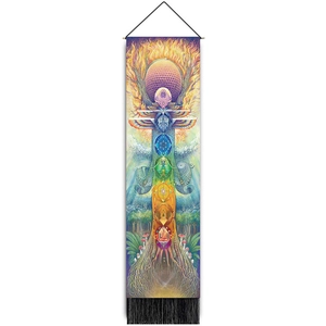 Detailed view of bohemian tree of life tapestry with chakra colors and black tassels