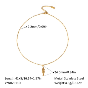 Detail shot of gold stainless steel fish pendant necklace with full dimension measurements