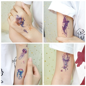 Waterproof glitter tattoo stickers featuring gradient butterflies and ocean mermaid designs