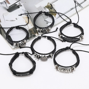 6-piece men's punk leather bracelet set with retro silver charms on a clean white surface