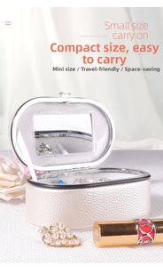 Mini white leather jewelry case with built-in mirror and soft velvet lining for rings