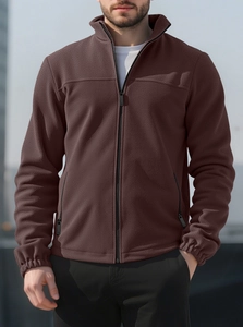 Detail of a men's polar fleece jacket showing zip-up standing collar and fabric texture