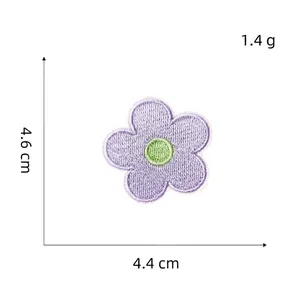 Detail of purple macaron flower embroidery patch with 4.6cm by 4.4cm dimensions