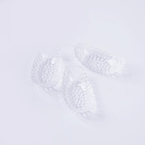 Set of three mini transparent glass banana boat bowls with decorative grape texture