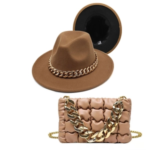 Matching set of brown fedora wool hat and beige quilted cloud bag with gold chunky chains