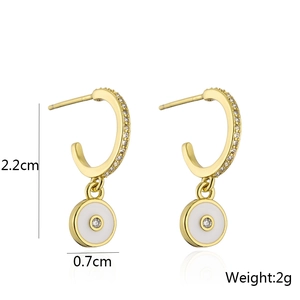 Detailed view of 18K gold C-shaped earrings with 2.2cm height and 0.7cm zircon pendant