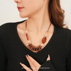Bohemian double-layer oval resin pendant necklace with brown woven cord for women