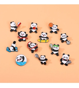 Flat lay of multiple panda sports alloy badges including tennis and weightlifting
