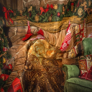 Detail of Christmas tapestry fabric showing festive fireplace and Christmas tree print