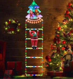 Detail of LED Santa climbing ladder with colorful fairy lights for outdoor garden decor