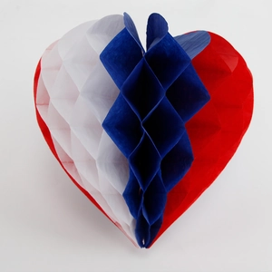 Detailed view of patriotic heart-shaped honeycomb paper ornament in red, white and blue