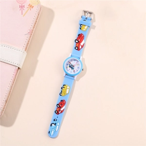 Close-up of light blue kids watch featuring 3D car patterns and easy-to-read dial numerals