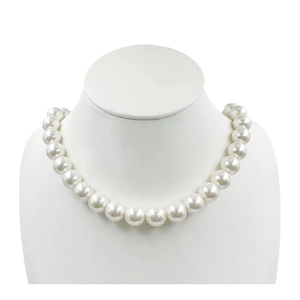 Elegant large round white pearl necklace displayed on a white neck model stand