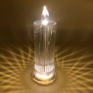 Bougie LED ciel étoilé avec texture en cristal et effet lumineux radial chaleureux