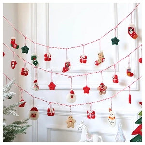 Handmade wool felt Christmas ornaments with Santa, snowmen and gingerbread men details