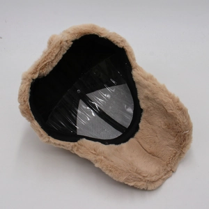 Detail of beige faux fur baseball cap showing black fabric lining and interior structure