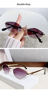 Detail of golden metal hinge with interlocking logo on double grey lens sunglasses