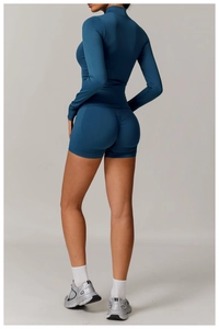 Rear view detail of navy blue seamless yoga set showing shaping and lifting design