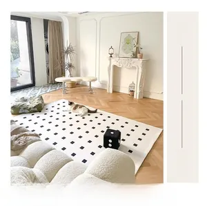 Detail of minimalist cream carpet with black grid in a sunny French style living room