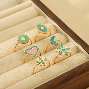 Bohemian gold stainless steel enamel ring set featuring flower and heart charms