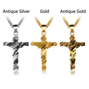 Three retro stainless steel cross necklaces in silver, gold and antique gold finishes