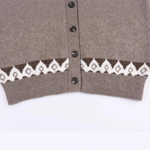 Brown knit cardigan with geometric jacquard patterns and button closure details